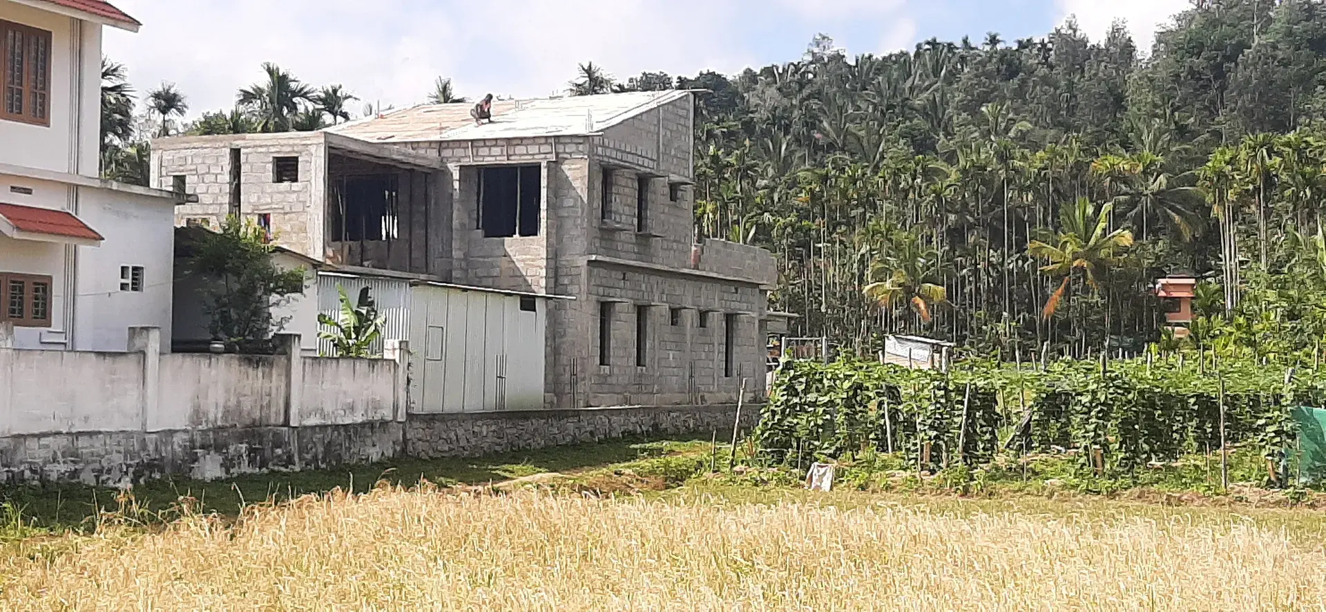 Residential Building in Gudalur, residential building by Prasanth Associates during construction